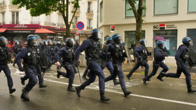 French anti-riot police running