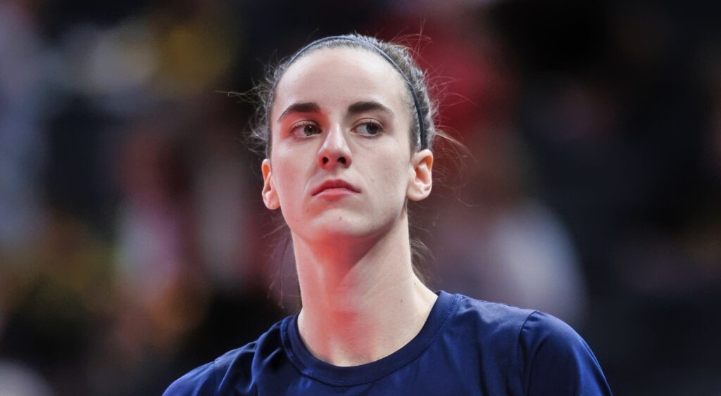 Caitlin Clark of Indiana Fever looking on.