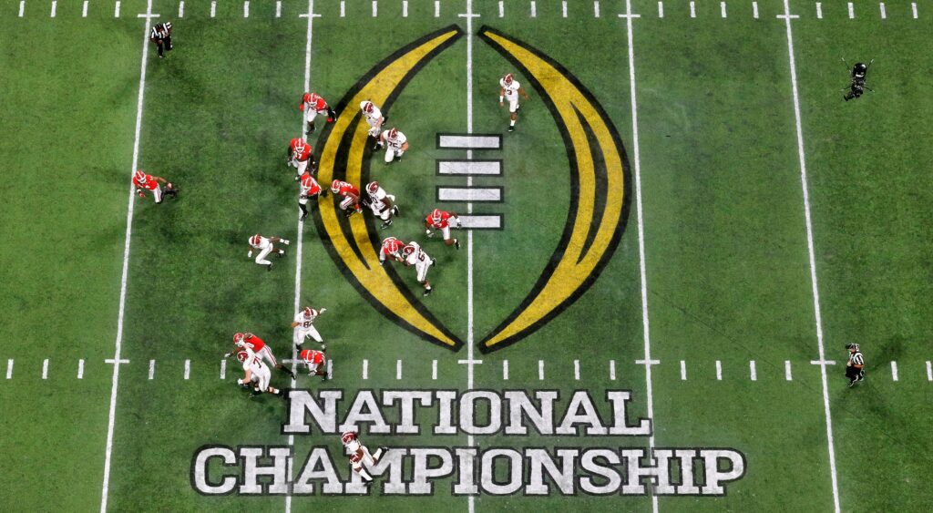 College football National Championship logo on the field.