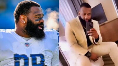 Isaiah Buggs in Lions uniform and posing in mirror