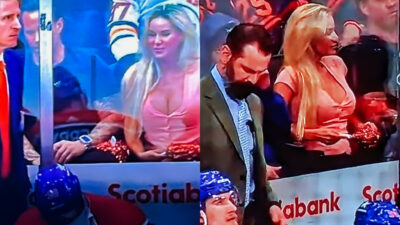 Photos of Viral female Oilers fan behind team bench