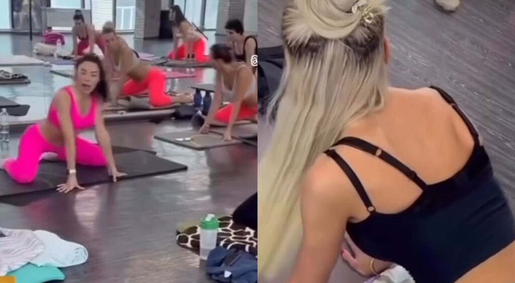 women on the floor during a fitness class