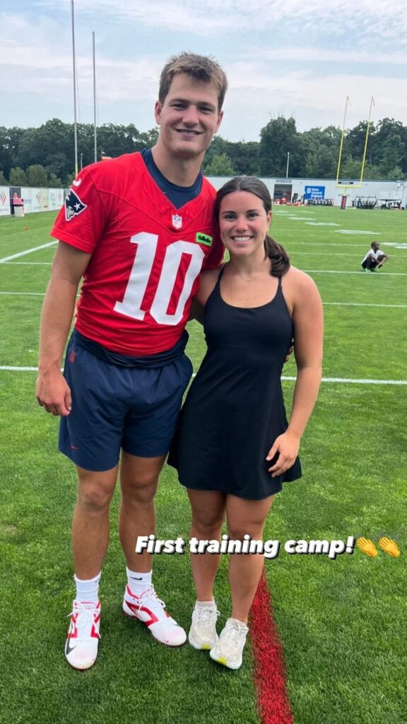 Drake Maye and Ann Michael Hudson pose for training camp photo 