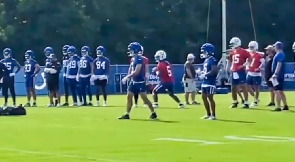 Anthony Richardson and Colts players on field