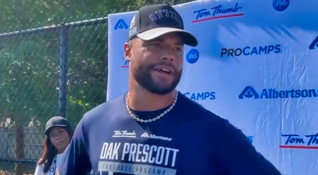 Dak Prescott speaks to the media at his football camp.