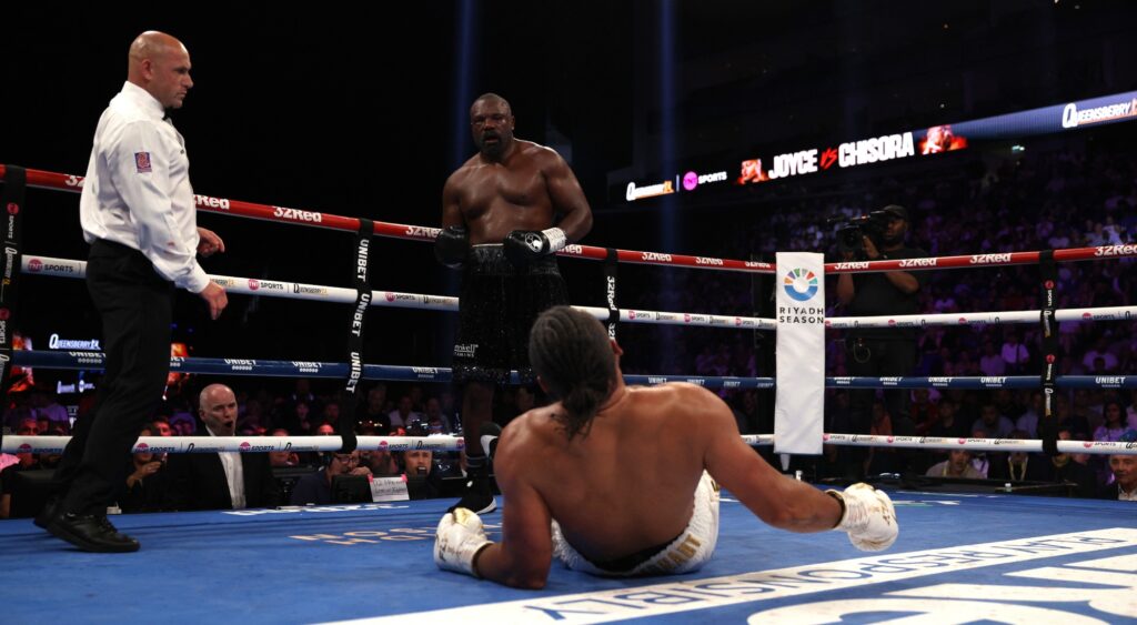  Derek Chisora knocks down Joe Joyce