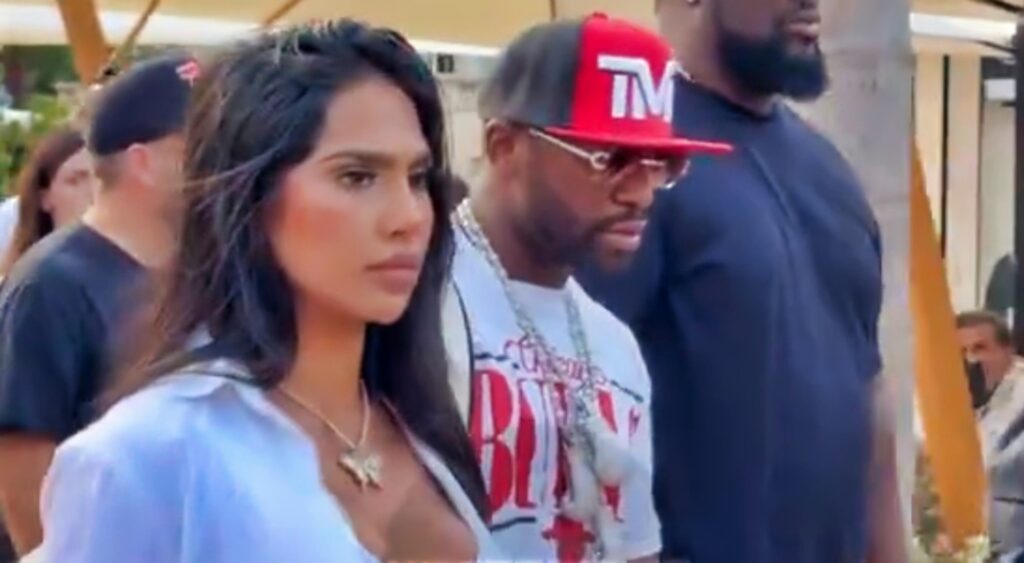 Floyd Mayweather and his girlfriend, Gallienne Nabila, walking down a street in Monaco.