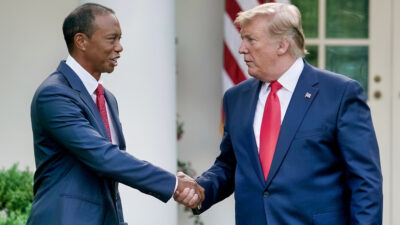 Tiger Woods shaking Donald Trump's hand