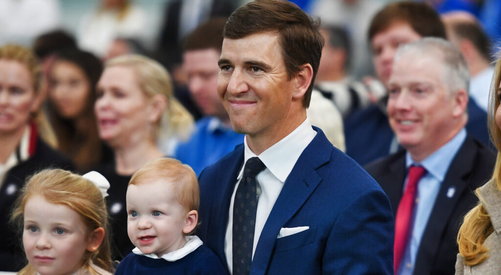 Eli Manning and his son