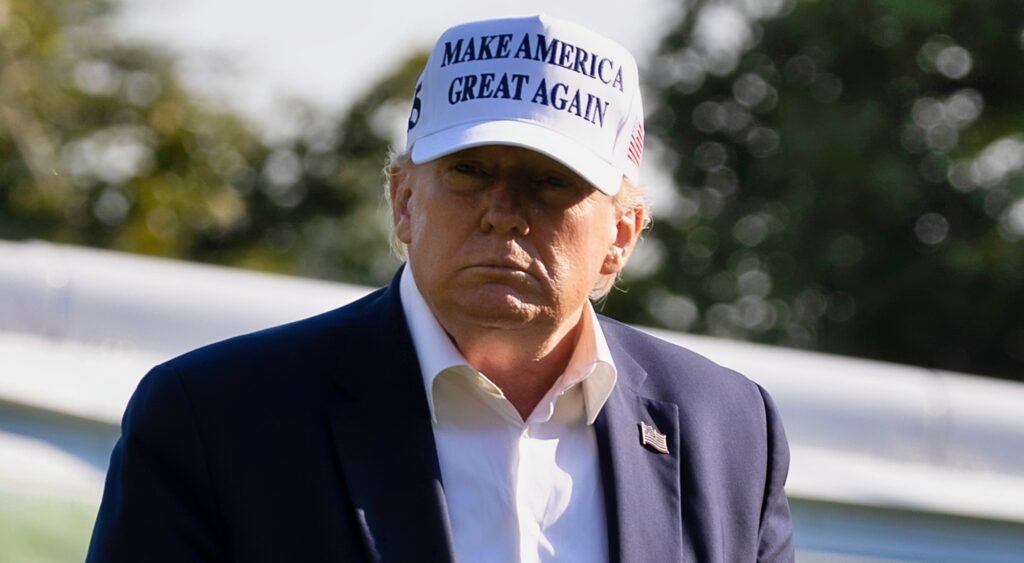 Donald Trump looking on at Trump National Golf Club.