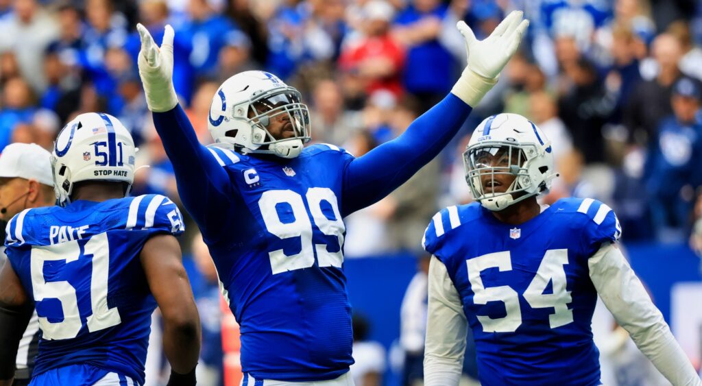 Indianapolis Colts star DeForest Buckner celebrating a sack.