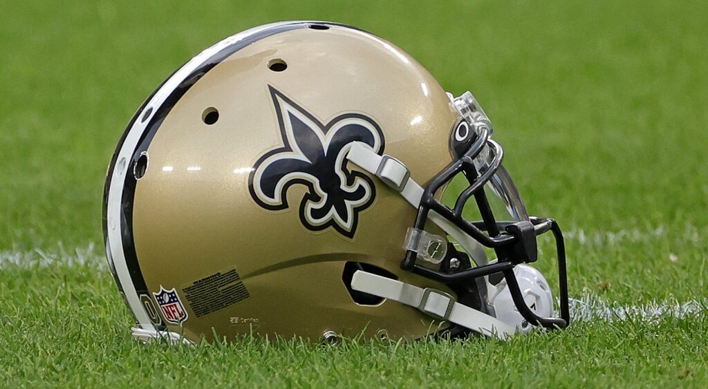 New Orleans Saints helmet shown on field.