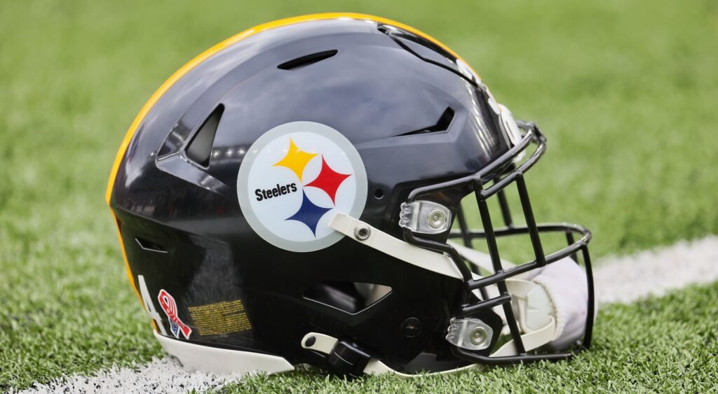 Pittsburgh Steelers helmet shown on field.