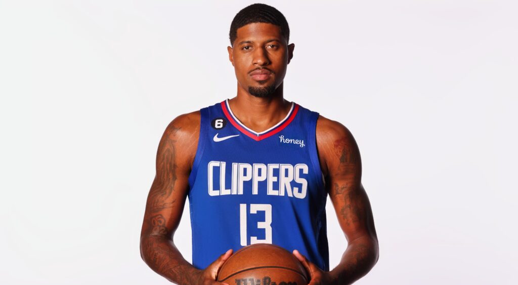 Paul George poses for a photo.