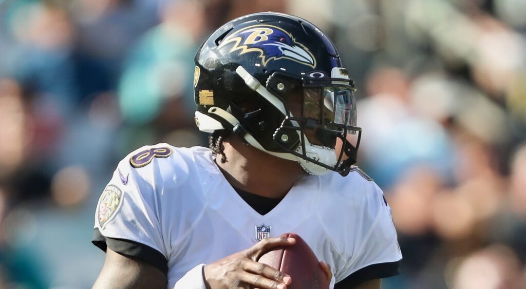 Lamar Jackson of Baltimore Ravens looking on.