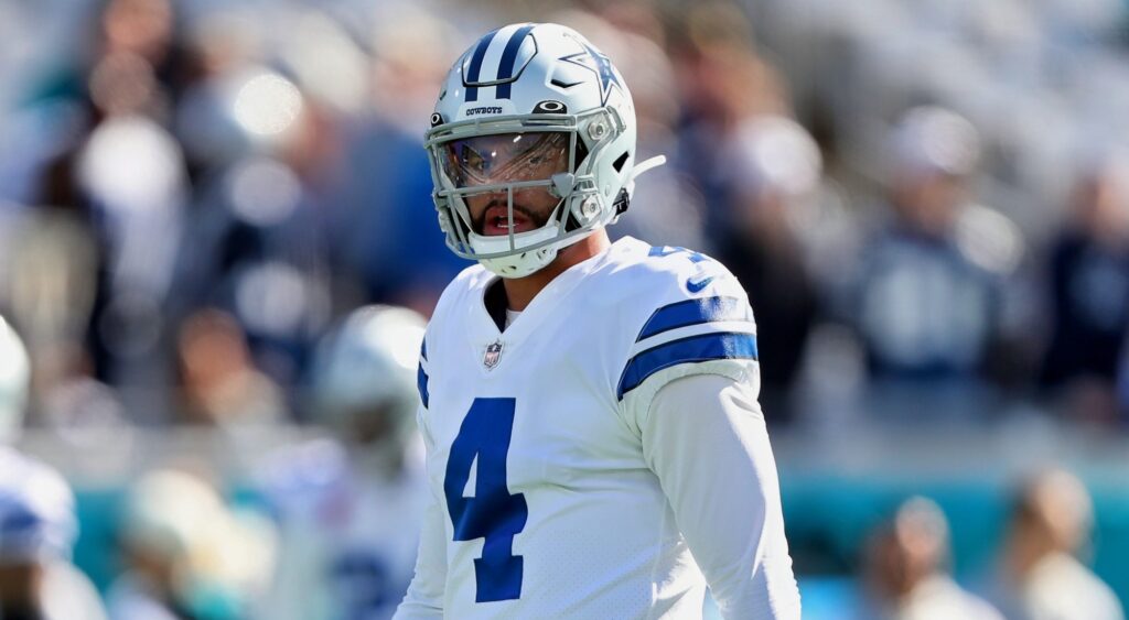 Dak Prescott of Dallas Cowboys looking on.