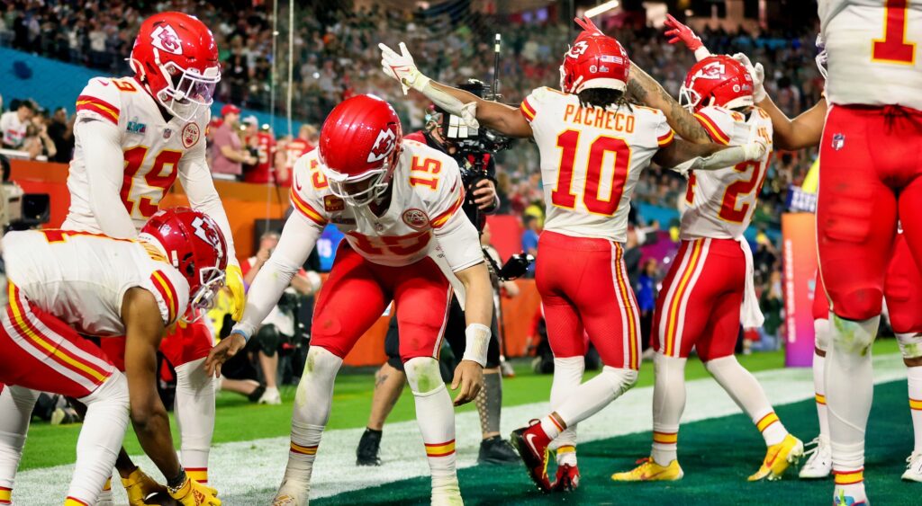 Kansas City Chiefs wide receiver Skyy Moore celebrates with his teammates.