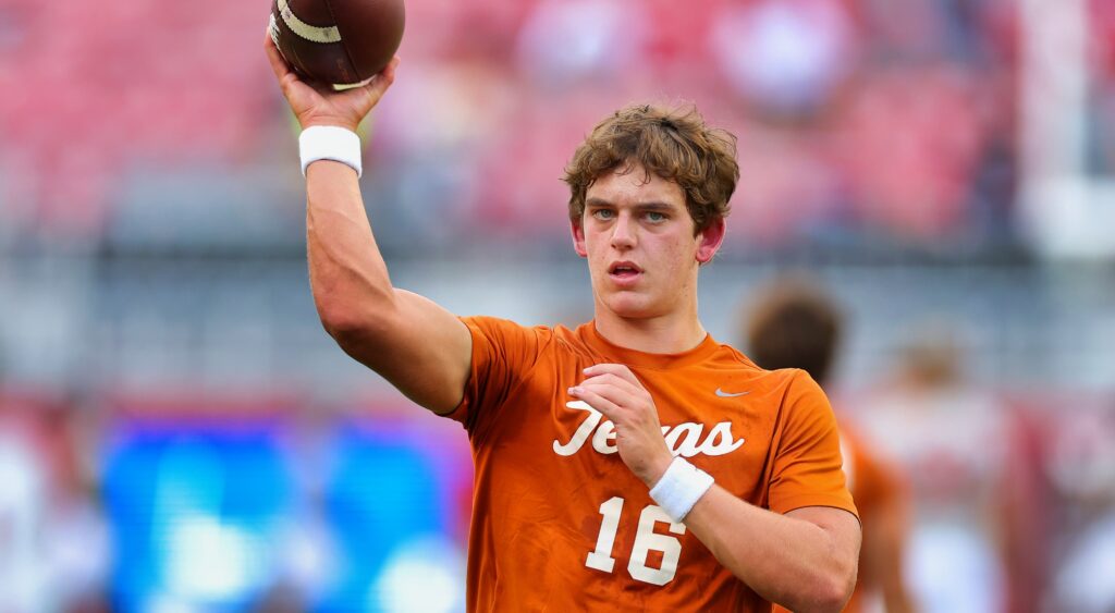 Arch Manning throwing a ball during warmups.