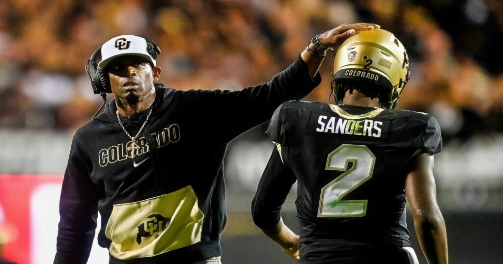 Deion Sanders and Shedeur Sanders react during Colorado Buffaloes game.