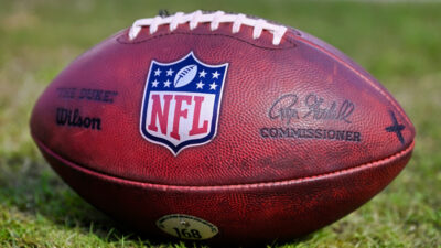 Photo of NFL football for article on former NFL coach