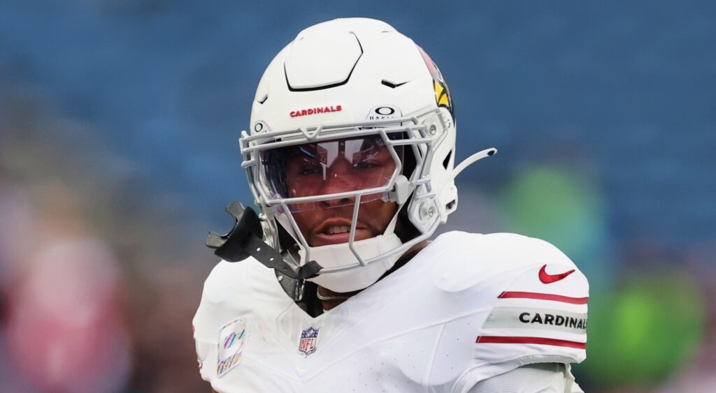 Arizona Cardinals safety Budda Baker looking on.