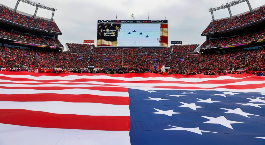 An American Flag on a football field before the game.