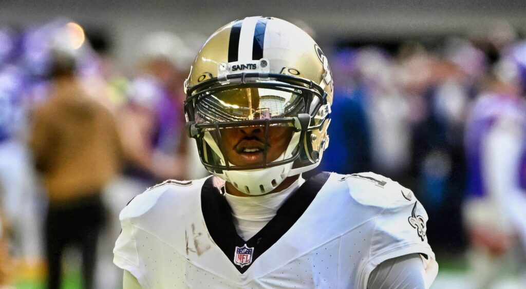 Michael Thomas of New Orleans Saints looking on.