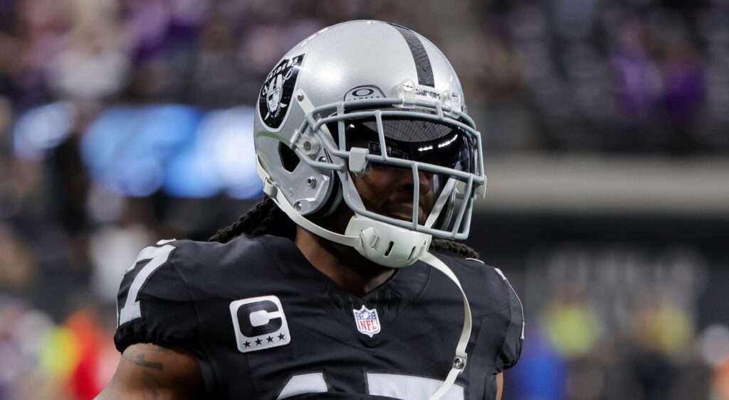 Davante Adams of Las Vegas Raiders looking on.