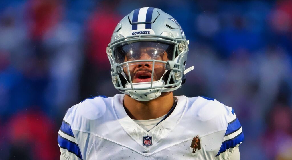 Dak Prescott of Dallas Cowboys looking on.