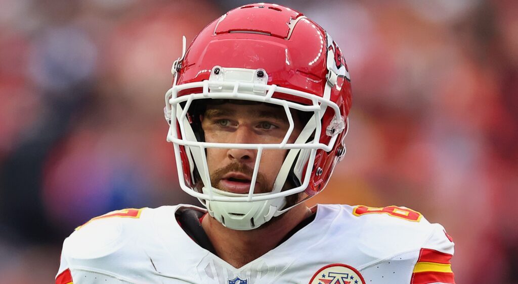 Travis Kelce of Kansas City Chiefs looking on.