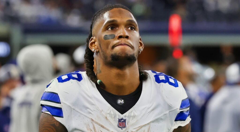 CeeDee Lamb of Dallas Cowboys looking on.