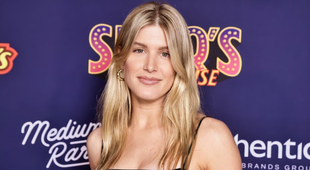 Genie Bouchard posing on the red carpet.