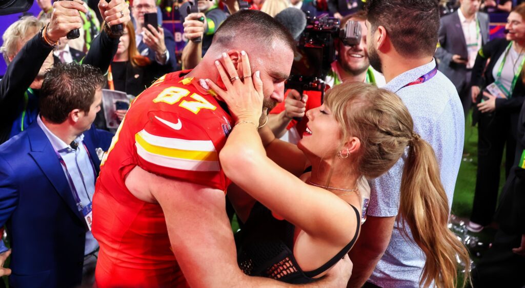 Travis Kelce and Taylor Swift embrace after Super Bowl.