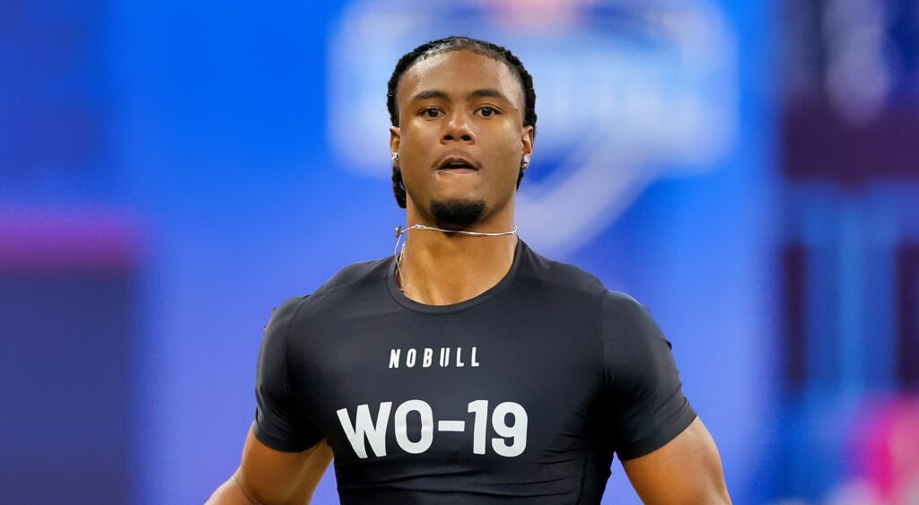 Adonai Mitchell looks on at NFL Combine.