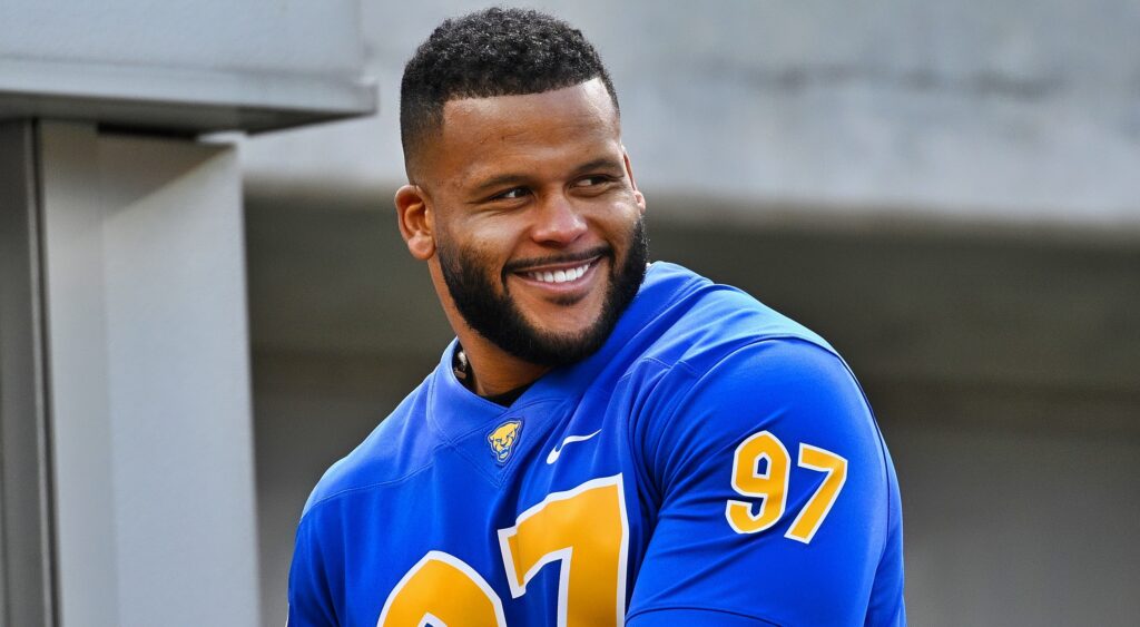 Aaron Donald looks on.