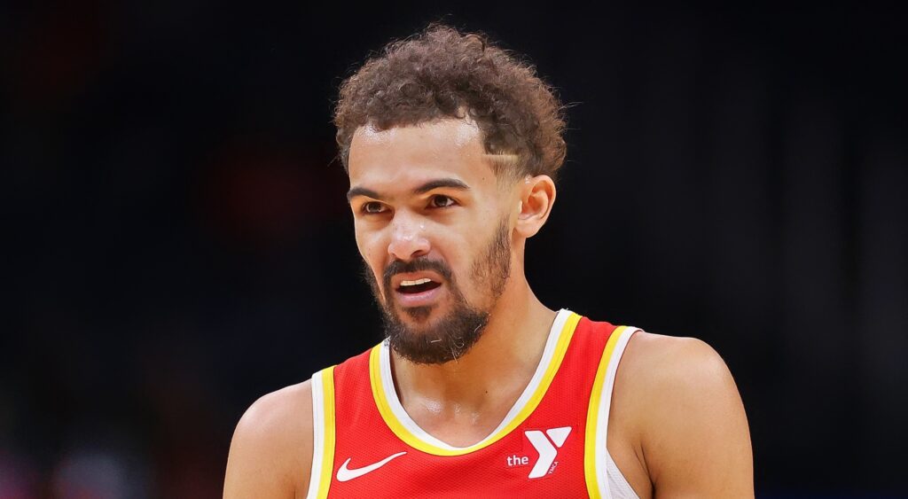 Trae Young of Atlanta Hawks looking on.