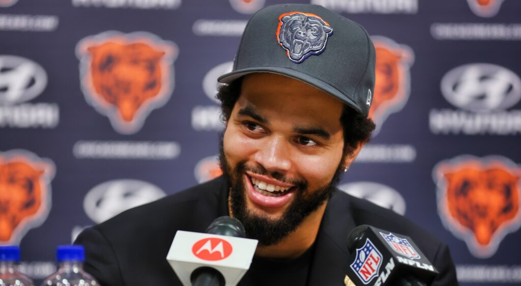 Caleb Williams at a press conference speaking.