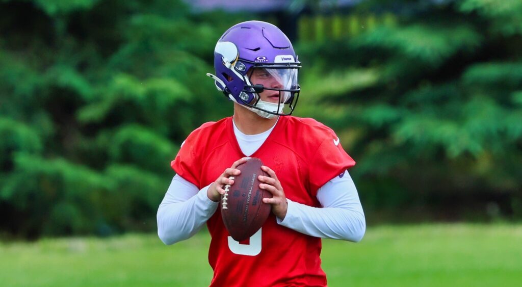 JJ McCarthy of Minnesota Vikings looking to throw in practice.