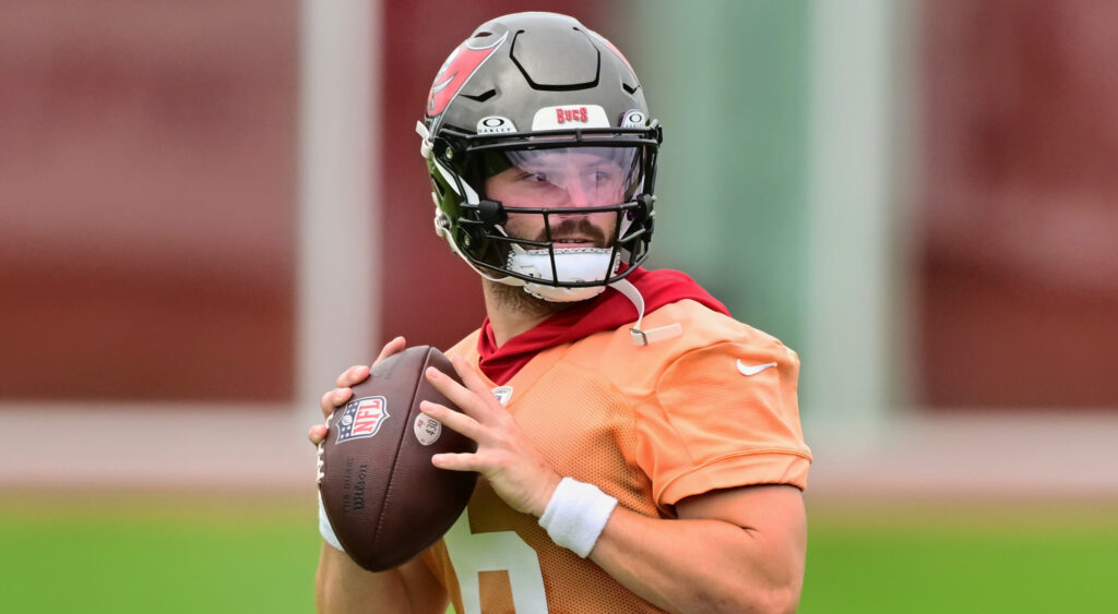 Baker Mayfield holding football