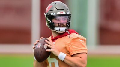 Baker Mayfield holding football