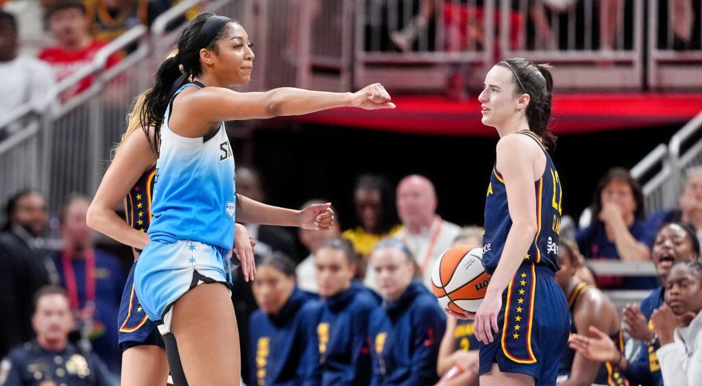 Angel Reese and Caitlin Clark react during game.