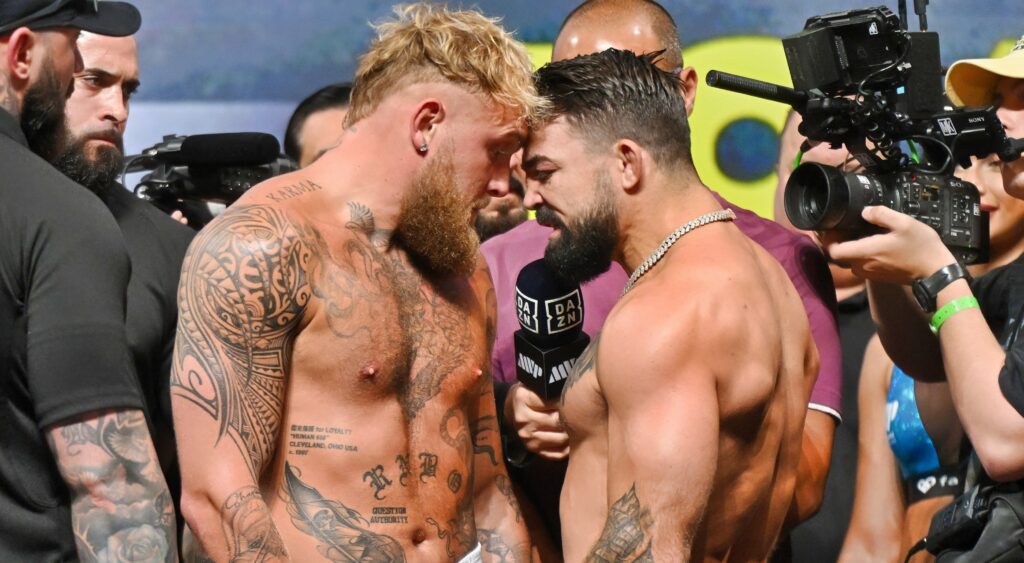 Jake Paul and Mike Perry face off at the weigh-in before their fight.