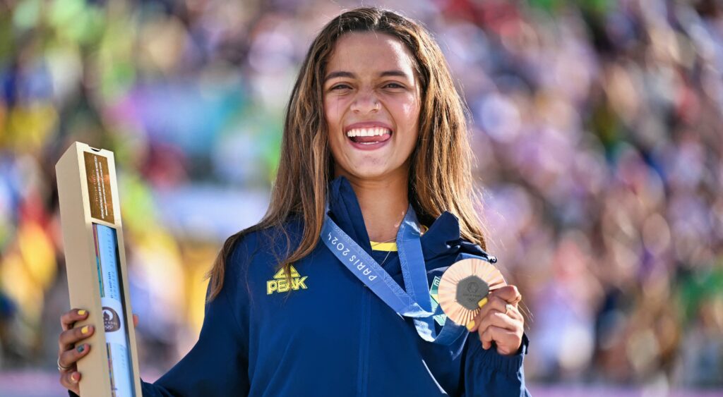 Bronze medallist Brazil's Rayssa Leal poses with her medal and gift box at the 2024 summer olympics.