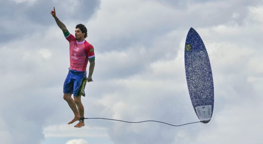 Surfer Gabriel Medina goes soaring through the air.