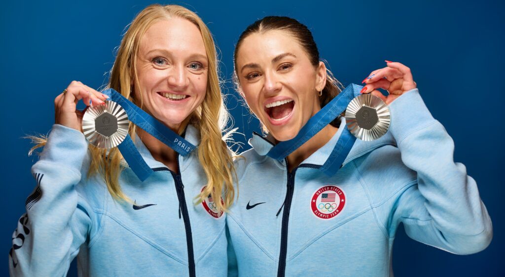 Sarah Bacon and Kassidy Cook holding silver medals