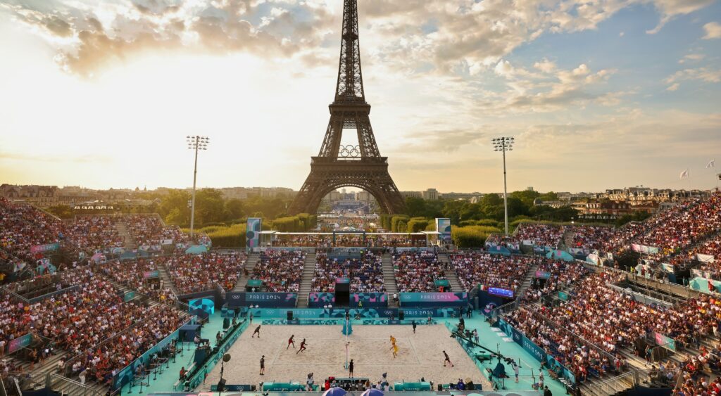 Paris Olympics Eiffel tower in background and beach volleyball