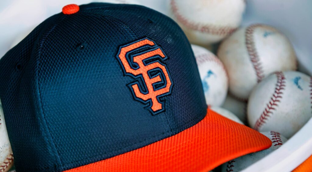 San Francisco Giants cap and baseballs 