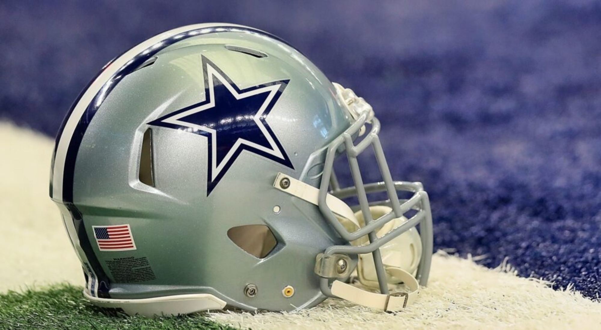 Dallas Cowboys helmet on the field.