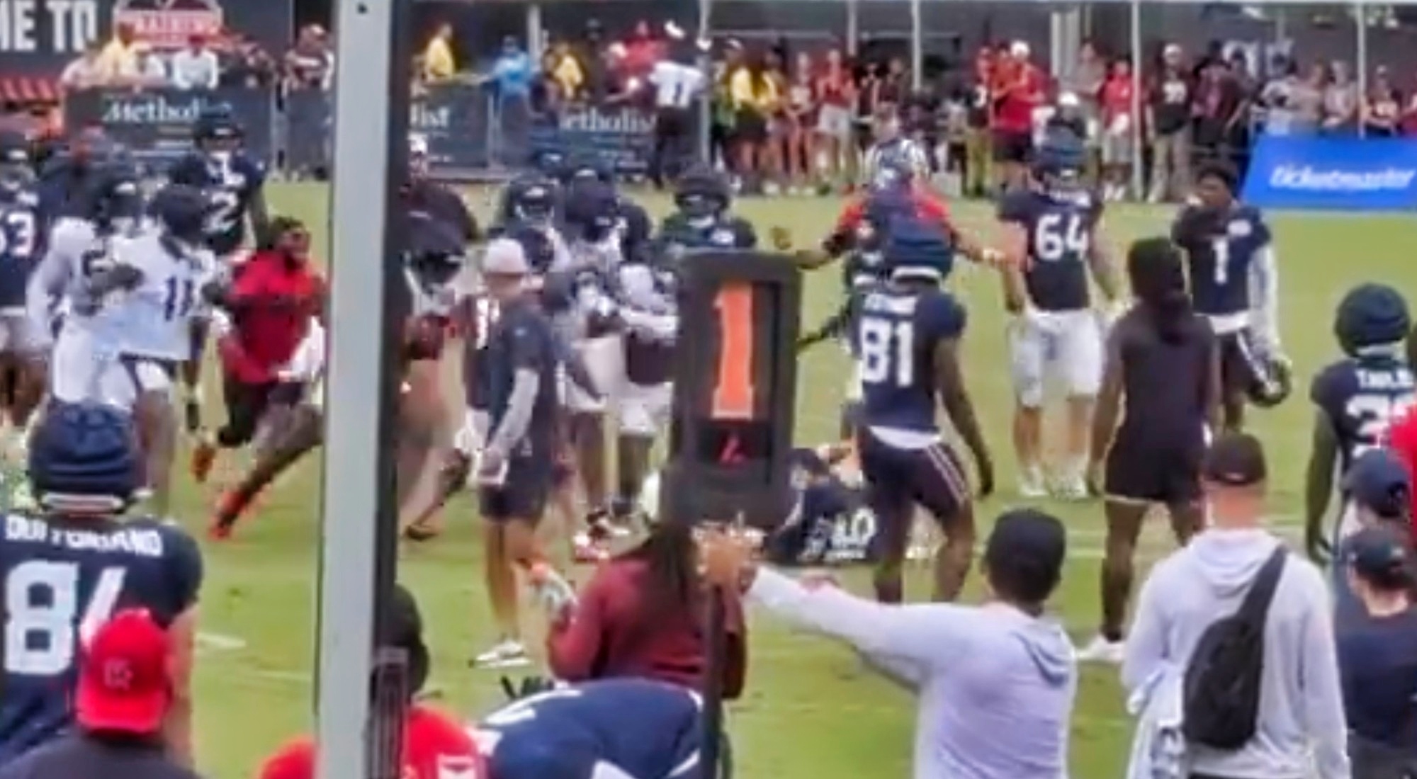 Houston Texans players fighting at training camp.