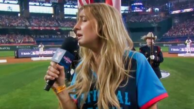 Ingrid Andress signing the National Anthem at the MLB Home un Derby